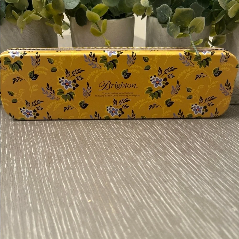 Brighton watch‎ tin with a pink floral design